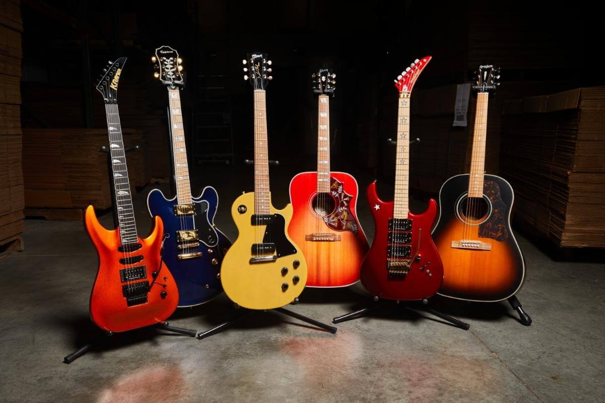 JoyRx Music & Gibson Guitar Giveaway (L-R): Kramer SM1 Orange, Epiphone Sheraton II Pro Midnight, Gibson LP Special TV Yellow, Gibson Hummingbird Faded Cherry, Kramer Jersey Star Red, and the Epiphone Masterbilt J-45 Acoustic. Photo: Gibson Press Release